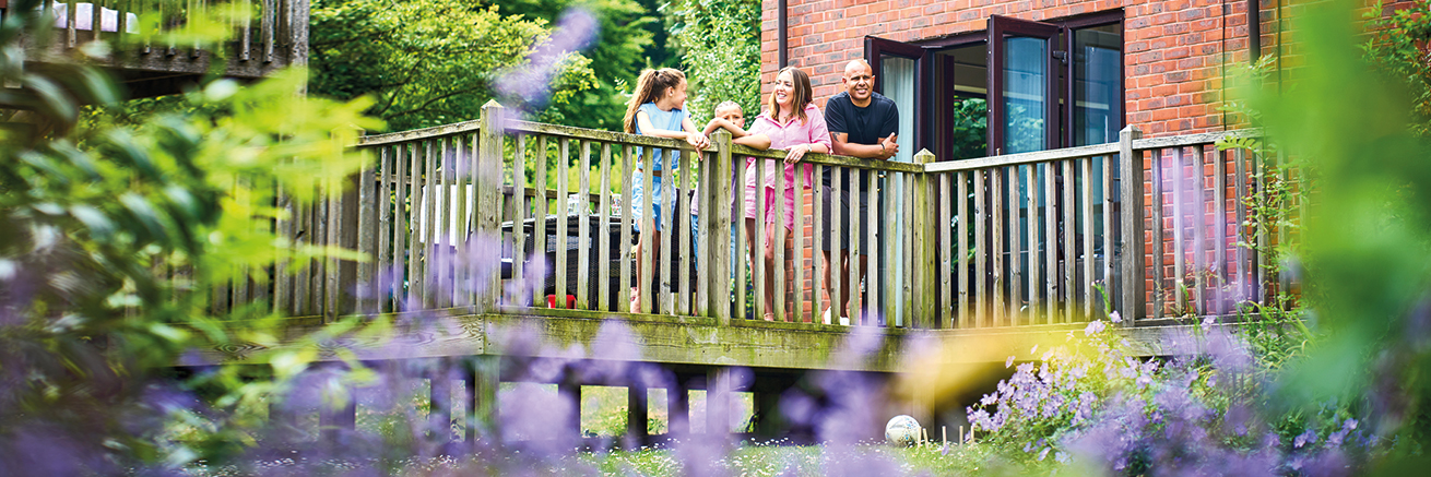 Family on the balcony at Whitemead Forest Park